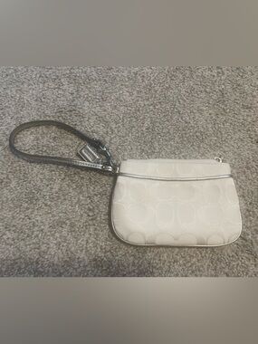 Coach Signature Small Wristlet in White with Silver Trim and Pink Inner Lining